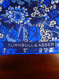 24/0323 TURNBULL & ASSER JERMYN ST. BLUE FLORAL PATTERN ALL SILK POCKET SQUARE
