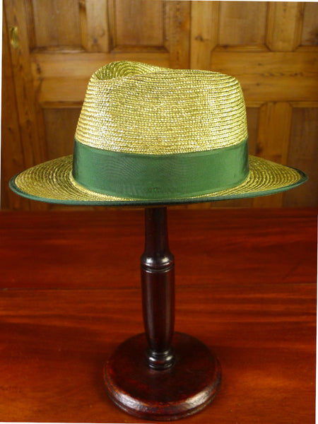 25/0407 new w/tags bittner straw trilby panama hat w/ green trim & band 61 cms