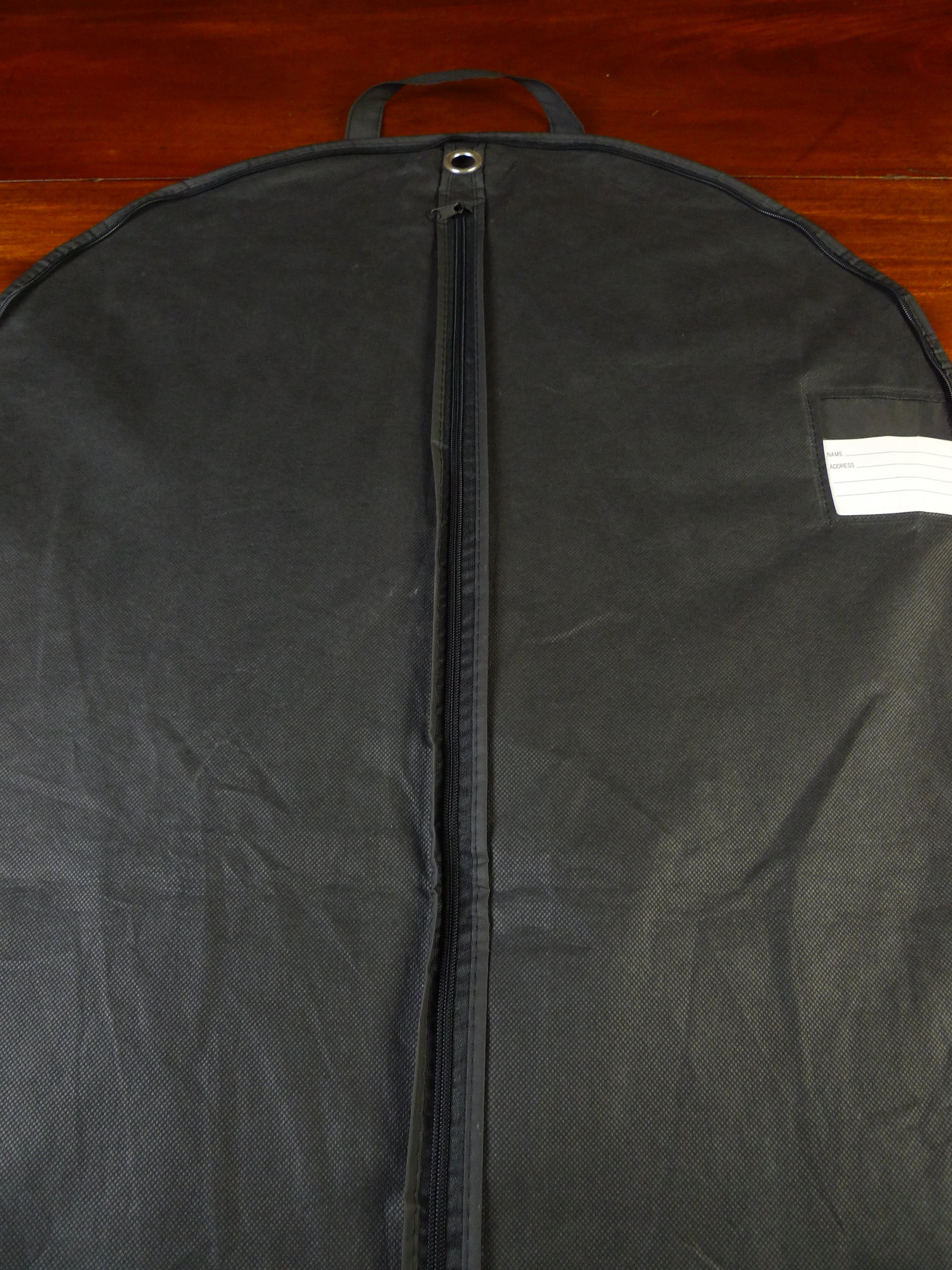 25/0482 davies & son savile row bespoke black woven plastic suit bag carrier