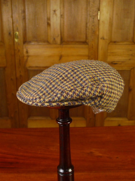 25/0836 brown gun check harris tweed flat cap 56 cms