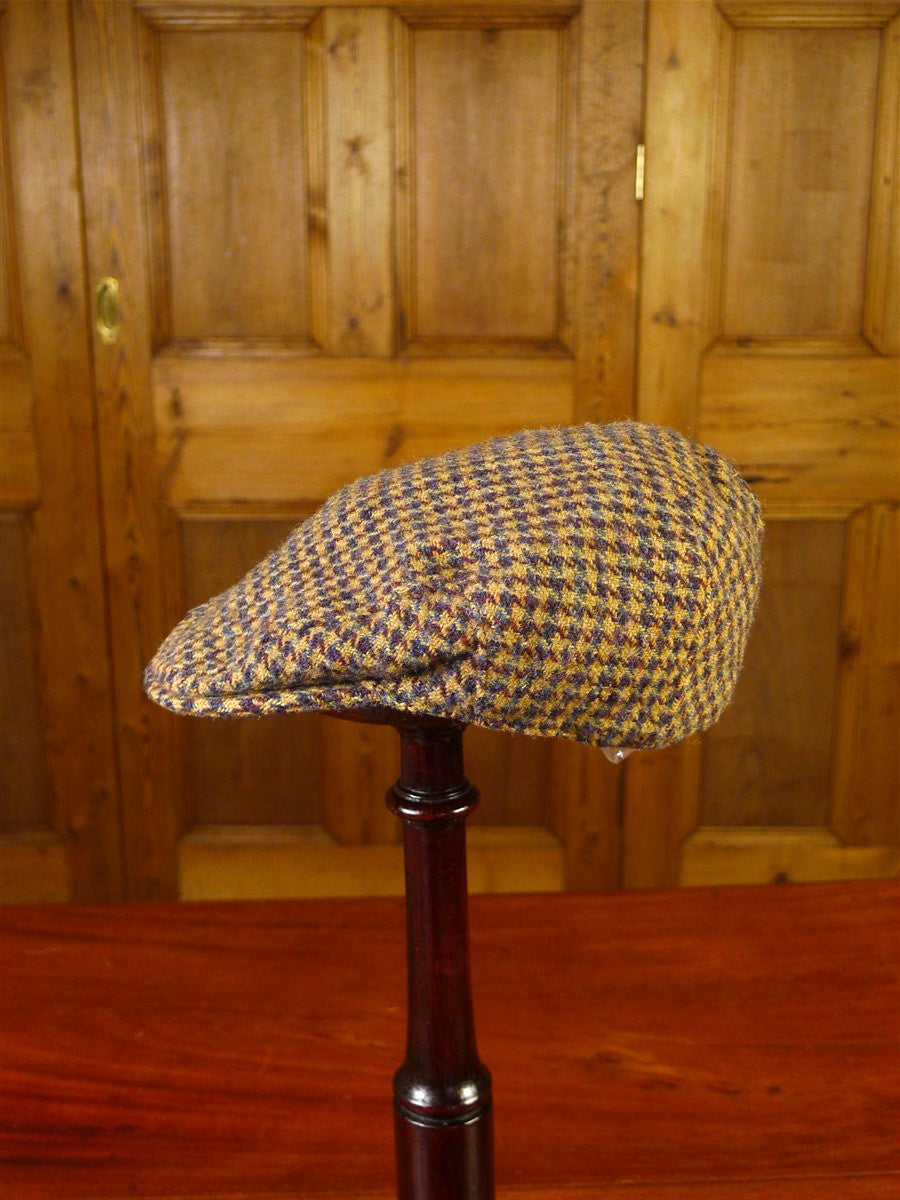 25/0836 brown gun check harris tweed flat cap 56 cms