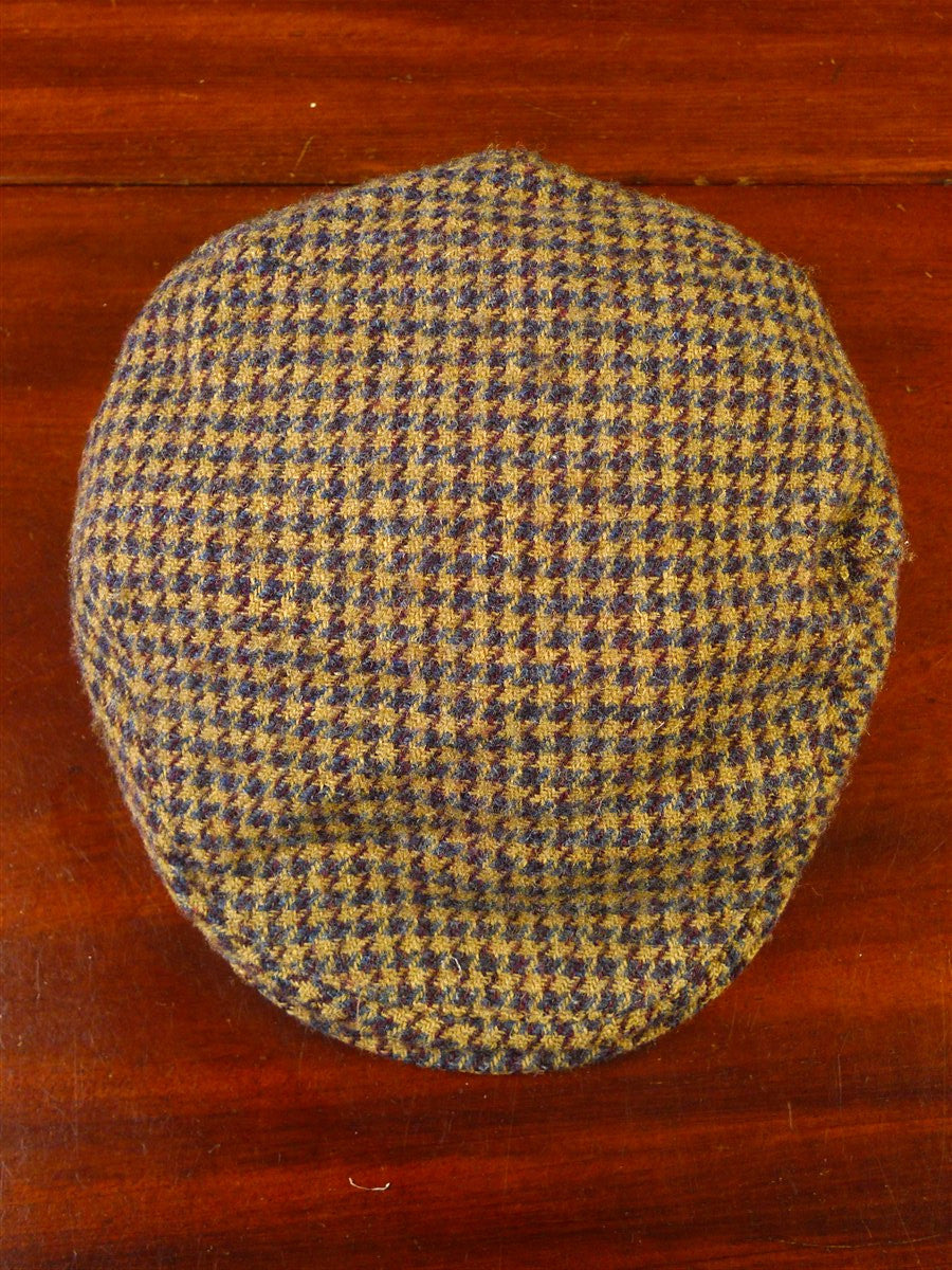 25/0836 brown gun check harris tweed flat cap 56 cms