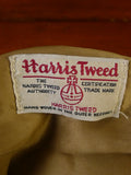 25/0836 brown gun check harris tweed flat cap 56 cms