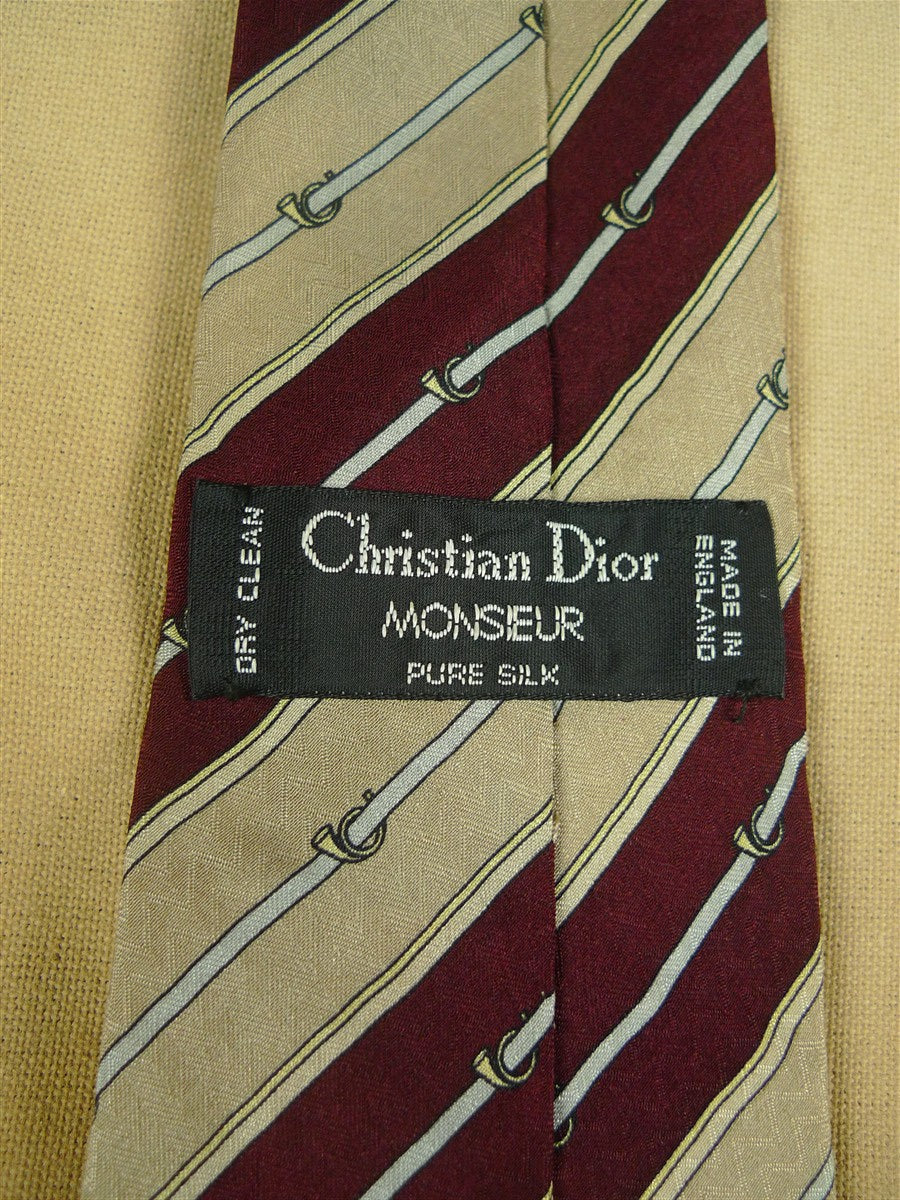 26/0897 wonderful vintage christian dior burgundy / beige striped silk tie w/ horn motif